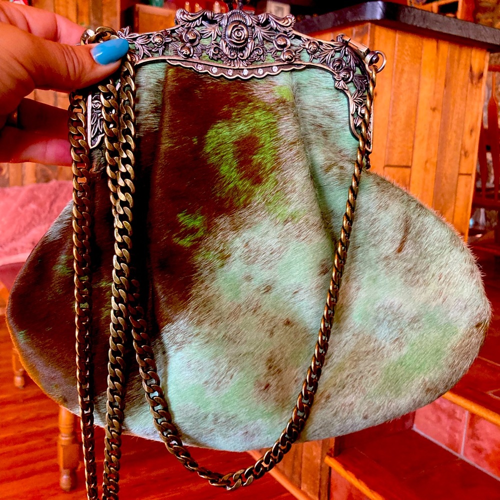 Vintage style American Darling cowhide clasp purse.